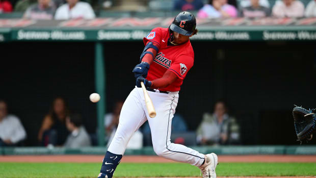 Sep 16, 2023; Cleveland, Ohio, USA; Cleveland Guardians catcher Bo Naylor (23) hits a single during the second inning against the Texas Rangers at Progressive Field.